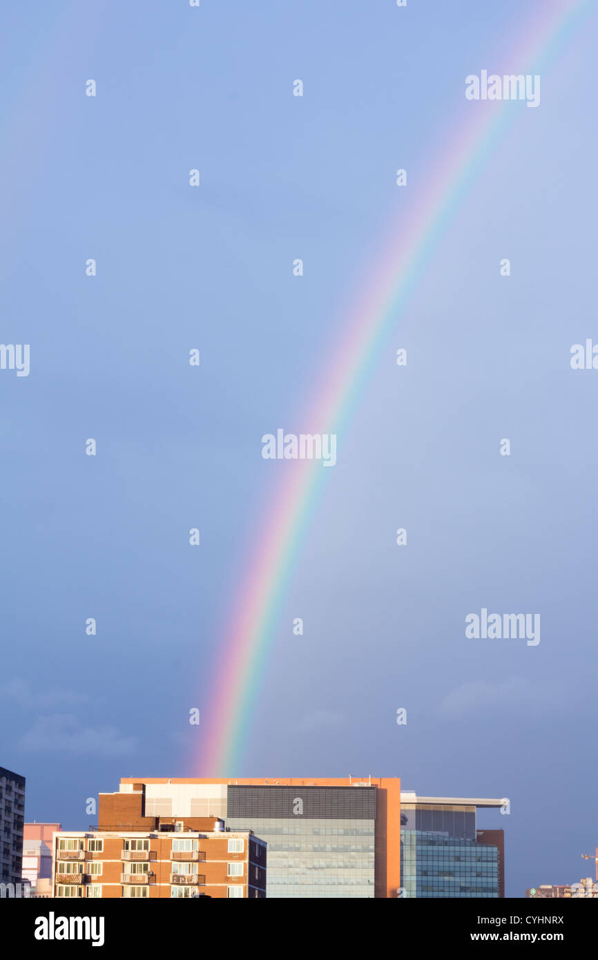 Rainbow over Concordia university - Montreal, QC - Stock Image