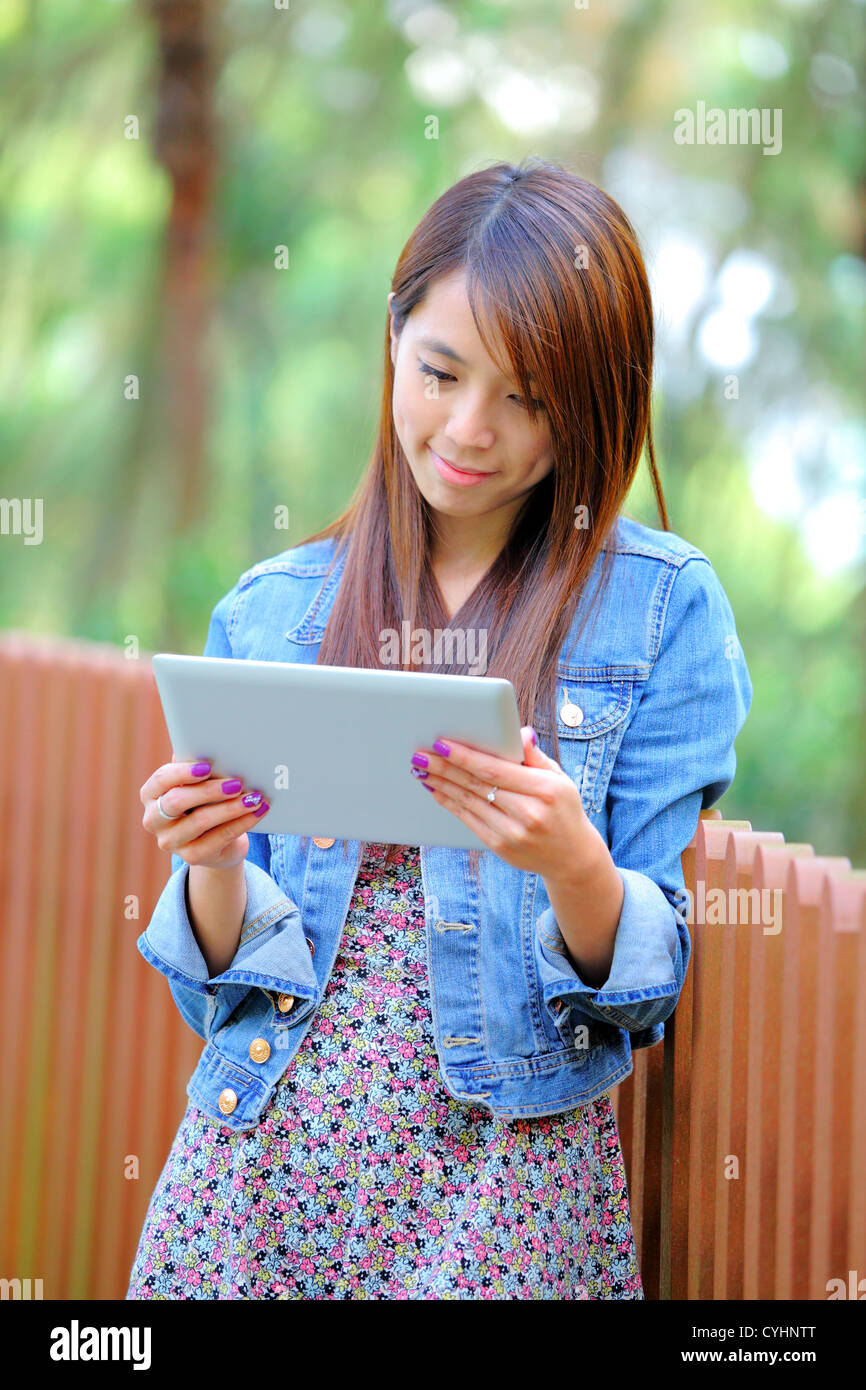 young asian woman with tablet pc Stock Photo - Alamy
