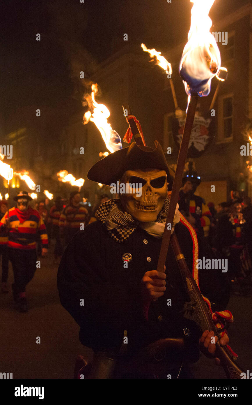 Lewes bonfire societies parade down the High Street of Lewes in East ...