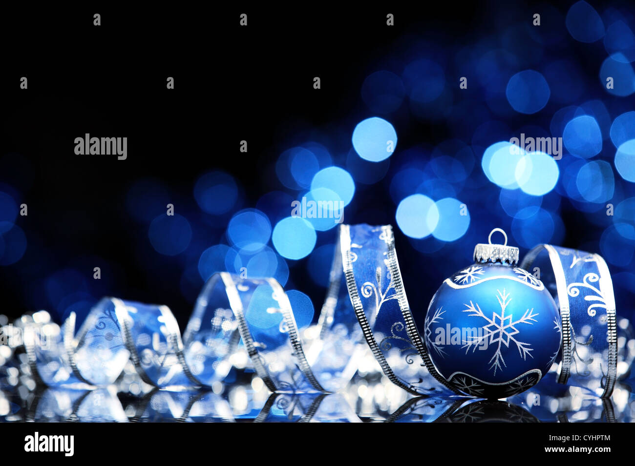 Christmas ball with ribbon on abstract light background,Shallow Dof. Stock Photo