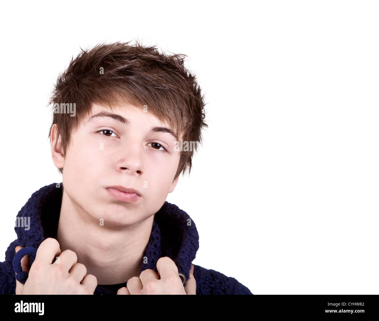 Closeup portrait of a shaggy teenager on a white background Stock Photo