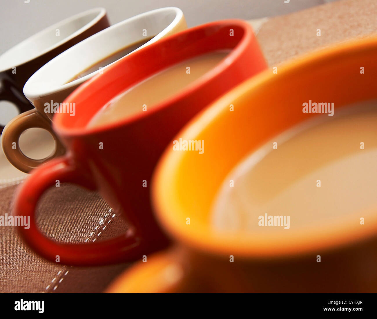 Coffee In Coffee Mugs In A Row Stock Photo