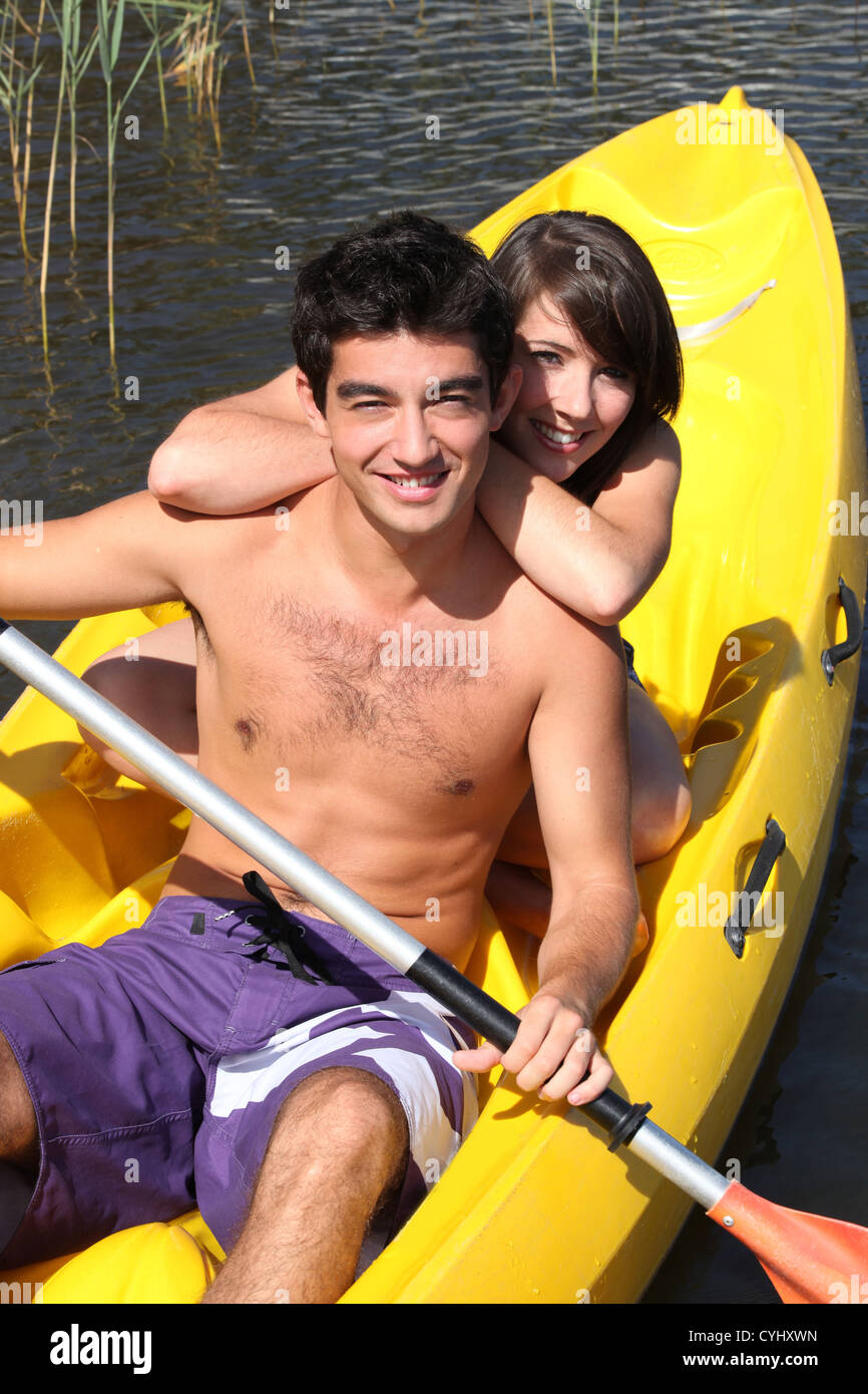 Teenagers kayaking Stock Photo