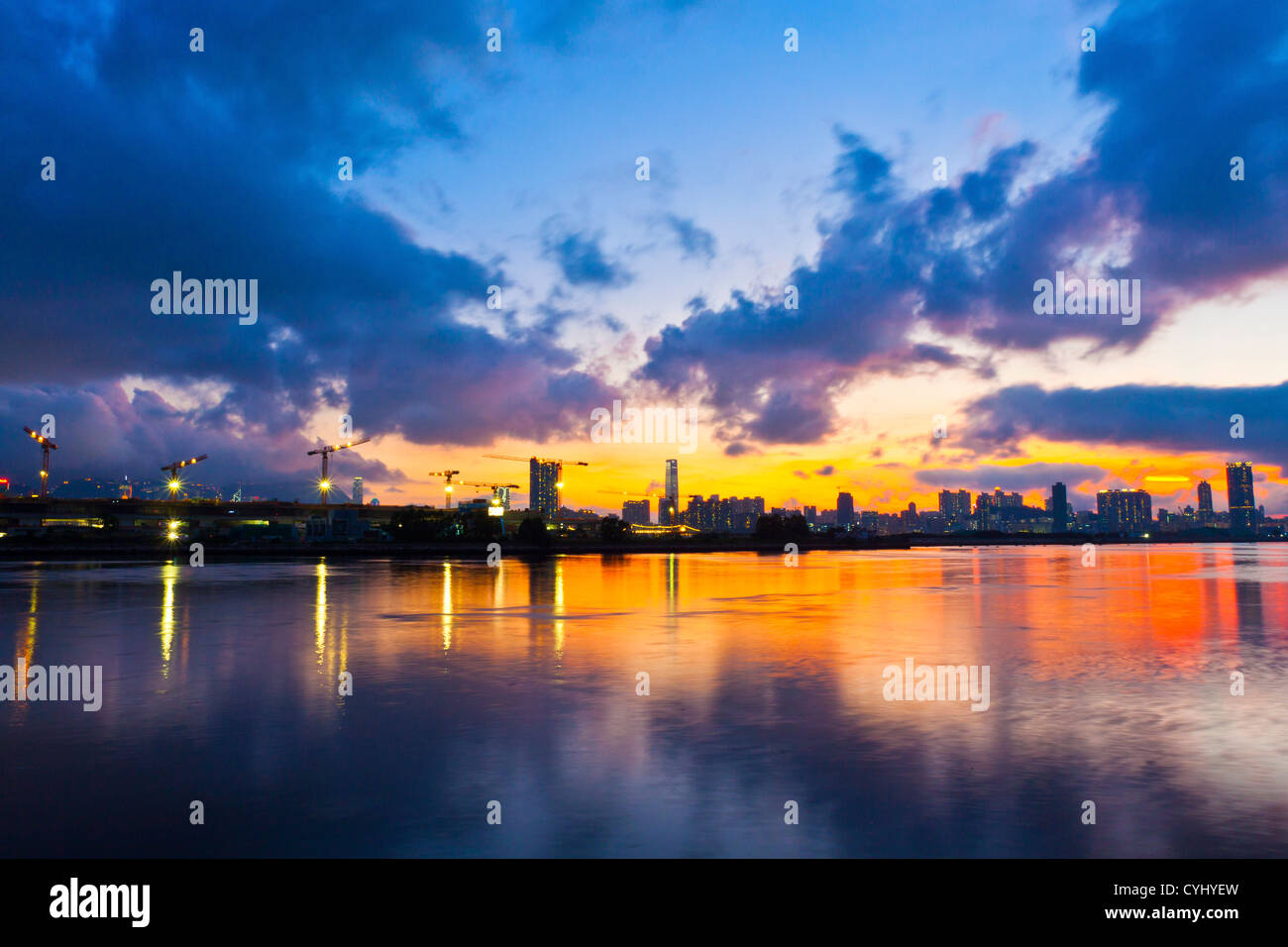 Hong Kong skyline at sunset Stock Photo - Alamy