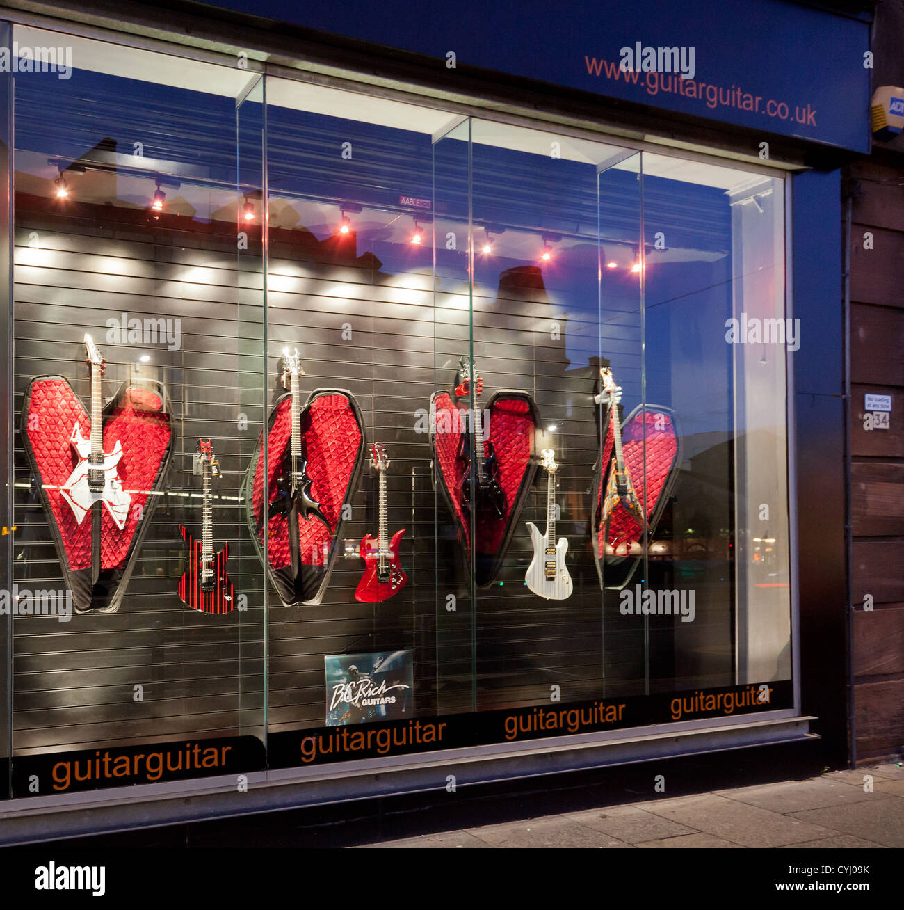 Window display: GuitarGuitar, specialist guitar store in Glasgow, Scotland, selling guitars and guitar accessories Stock Photo
