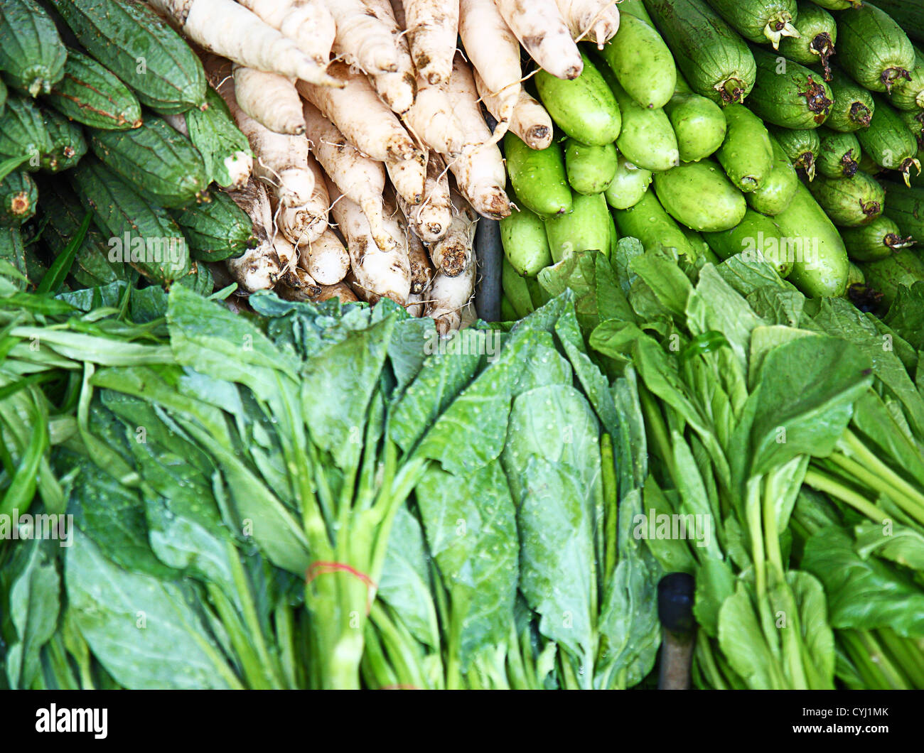 Assortment Of Green Vegetables On A Market Stall Stock Photo Alamy