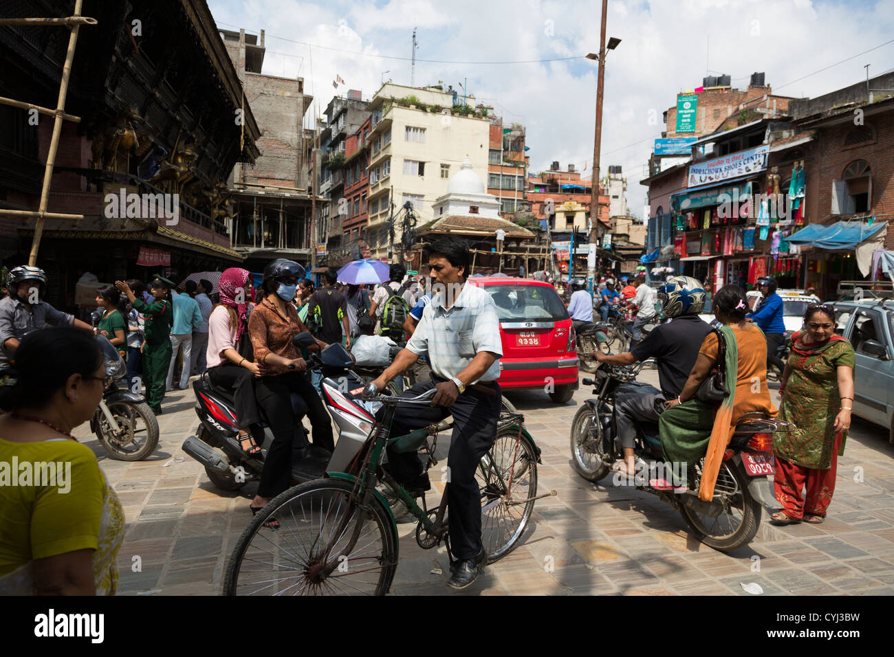City life in Indra Chowk area north of Durbar square, Kathmandu, Nepal Stock Photo