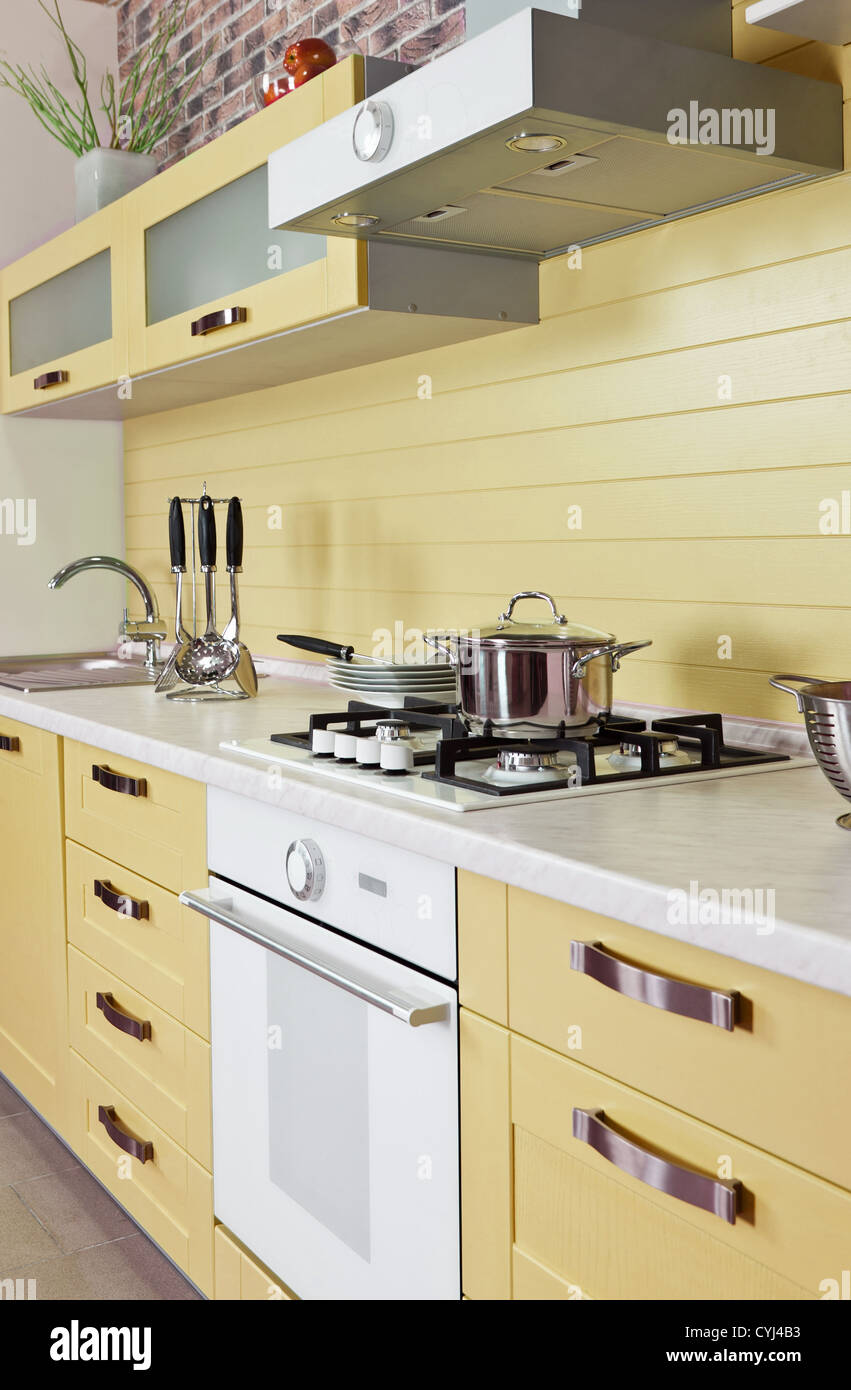 Luxurious new beige kitchen with modern appliances Stock Photo Alamy