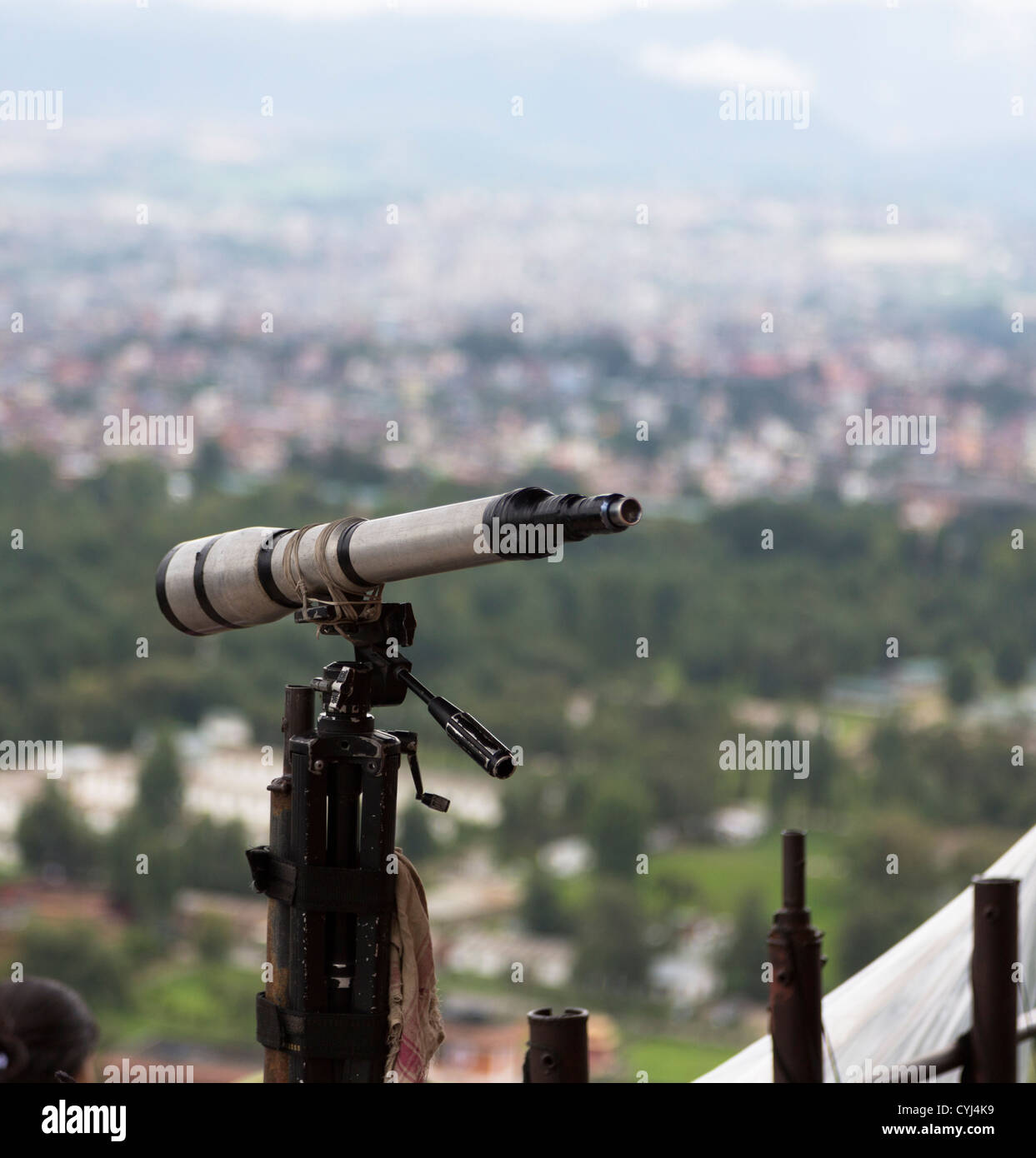 Telescope in Kathmandu with a view above the city Stock Photo Alamy