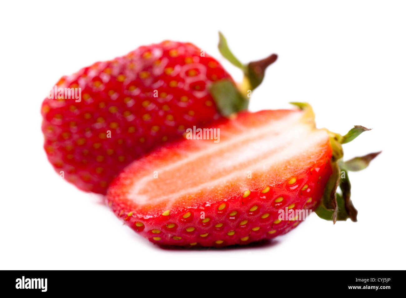 Macro view of a fresh strawberry over white background Stock Photo