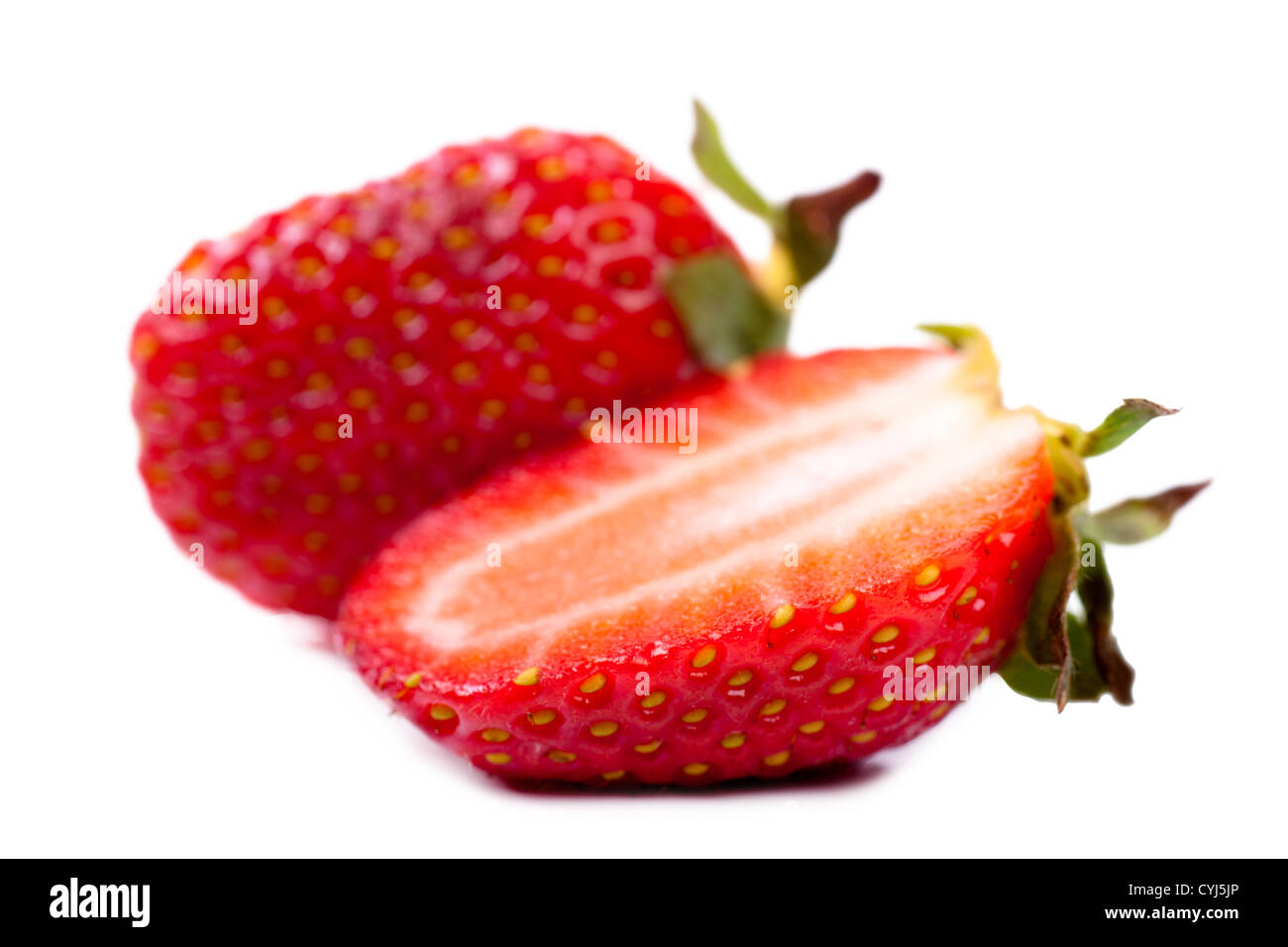 Macro view of a fresh strawberry over white background Stock Photo - Alamy