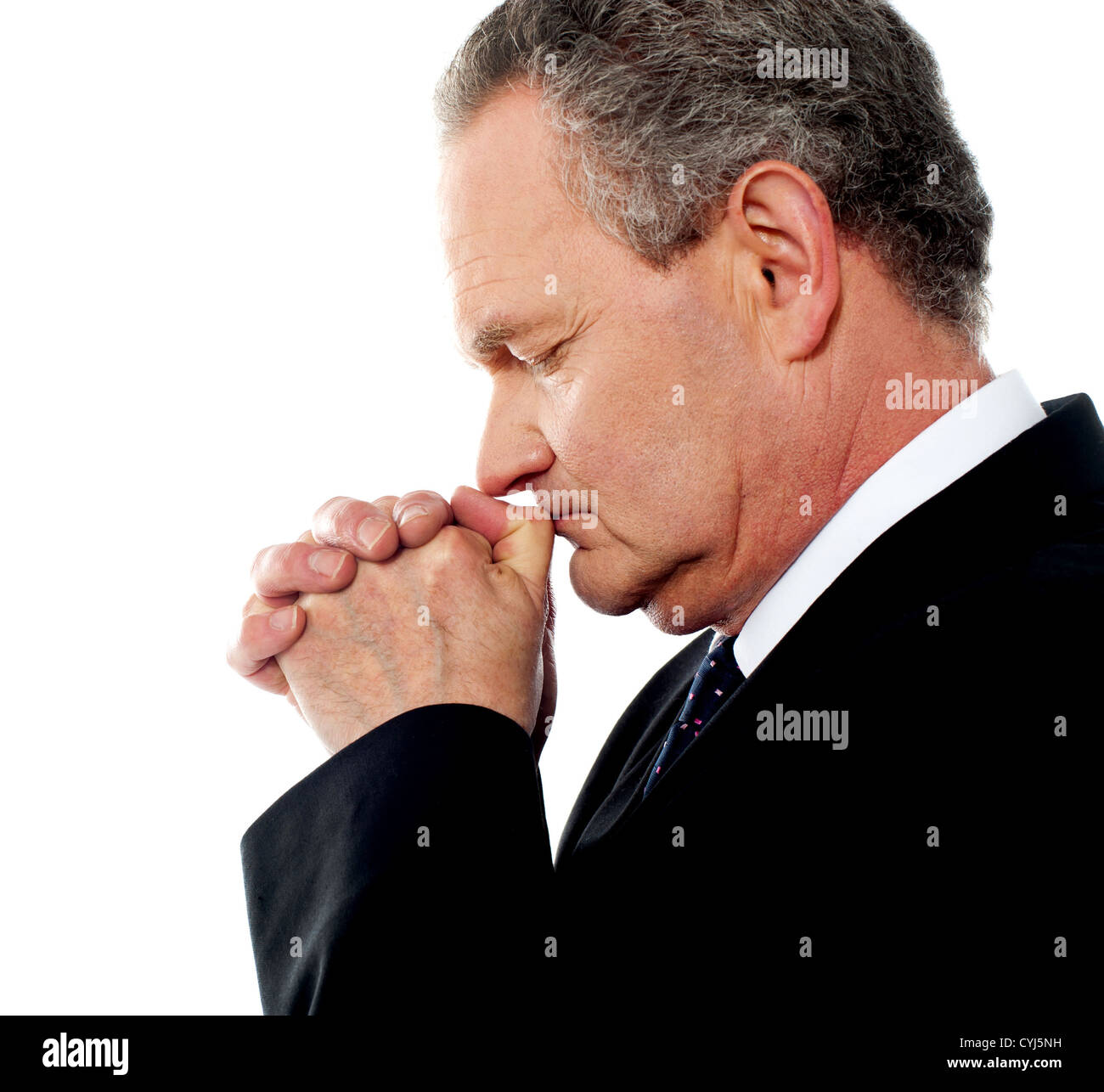 Business person praying god to God. Eyes closed Stock Photo
