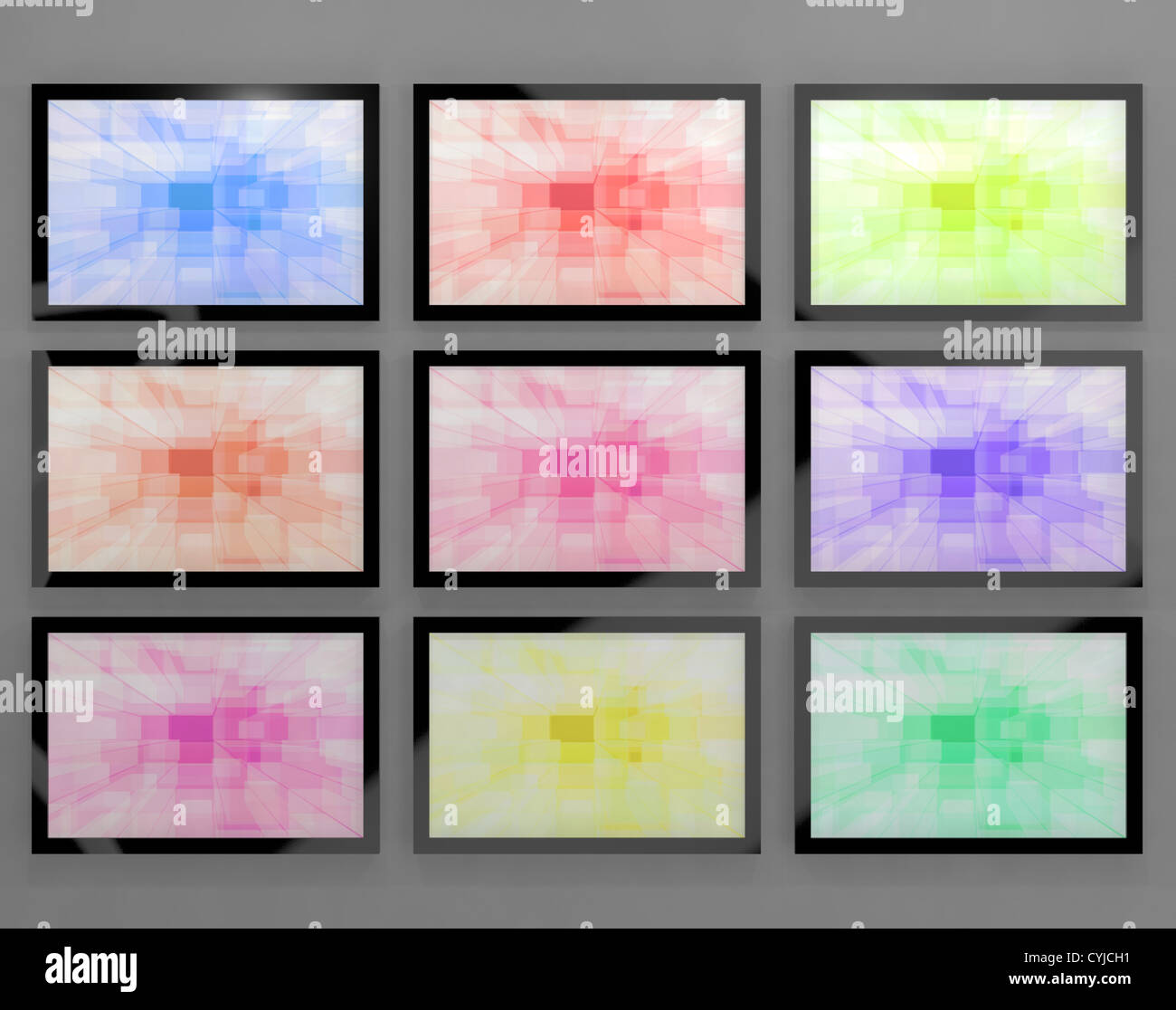 TV Monitors Wall Mounted In Different Colors Representing High Definition Televisions Or HDTV Stock Photo
