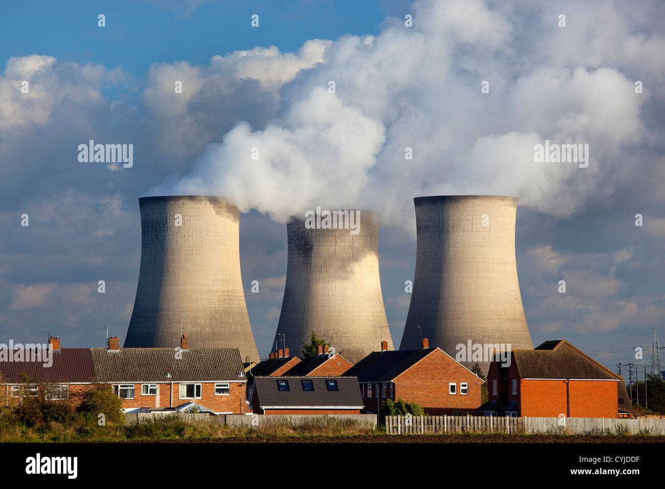 cooling towers and electricity pylons at coal fired power station in England Stock Photo