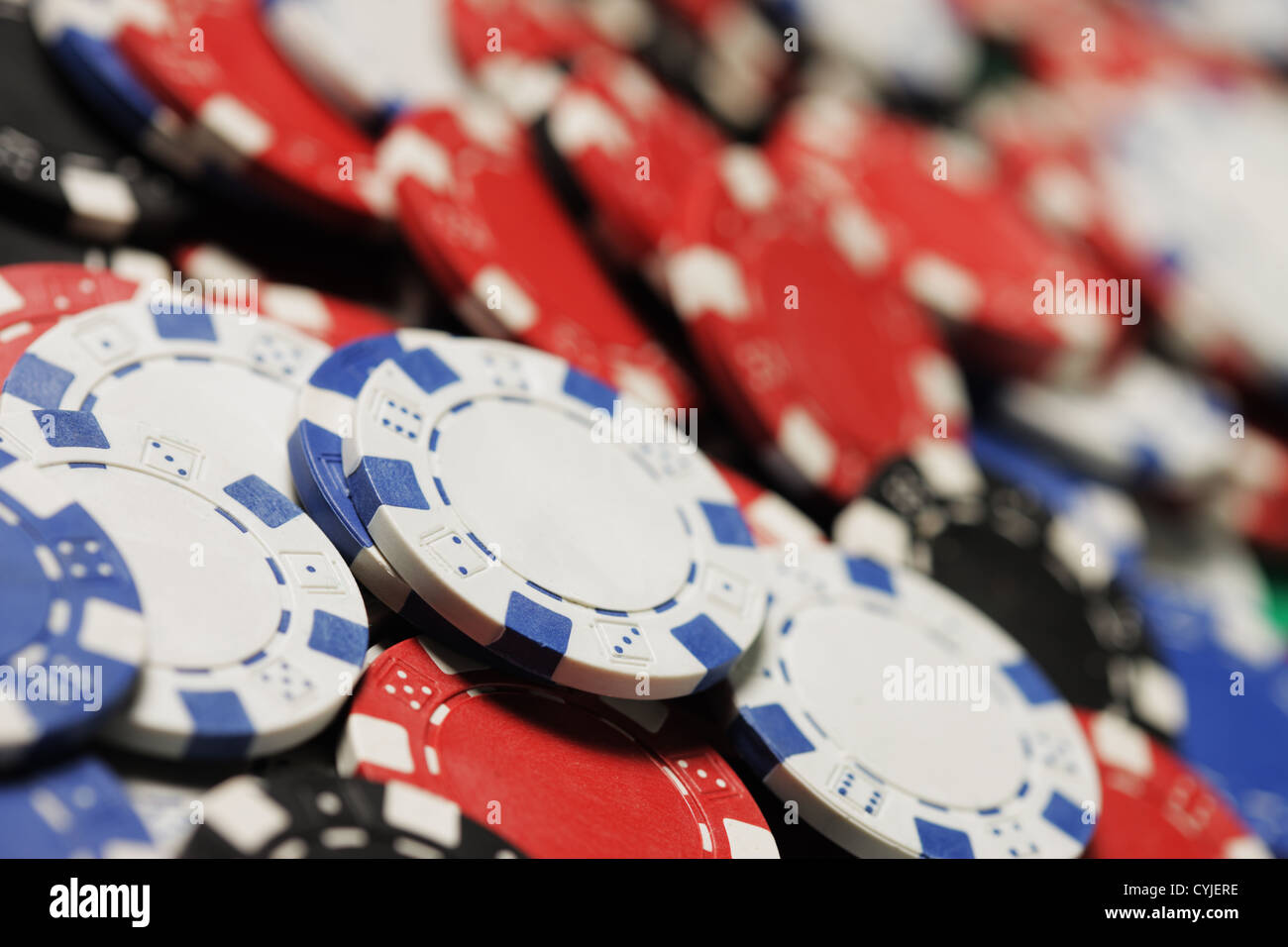 Poker Chips multi colored close up Stock Photo Alamy