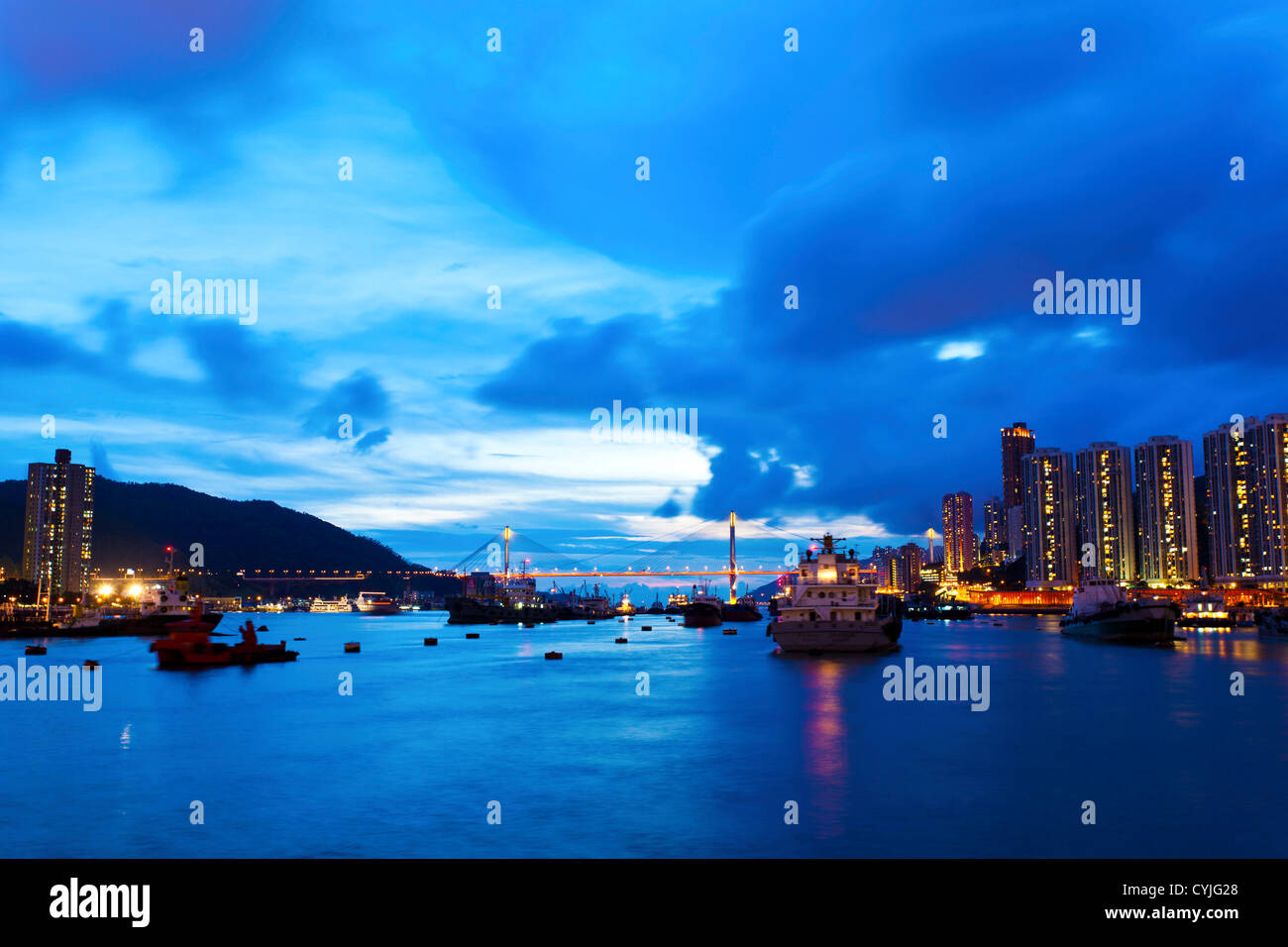Hong Kong bridge and apartment blocks at night Stock Photo - Alamy