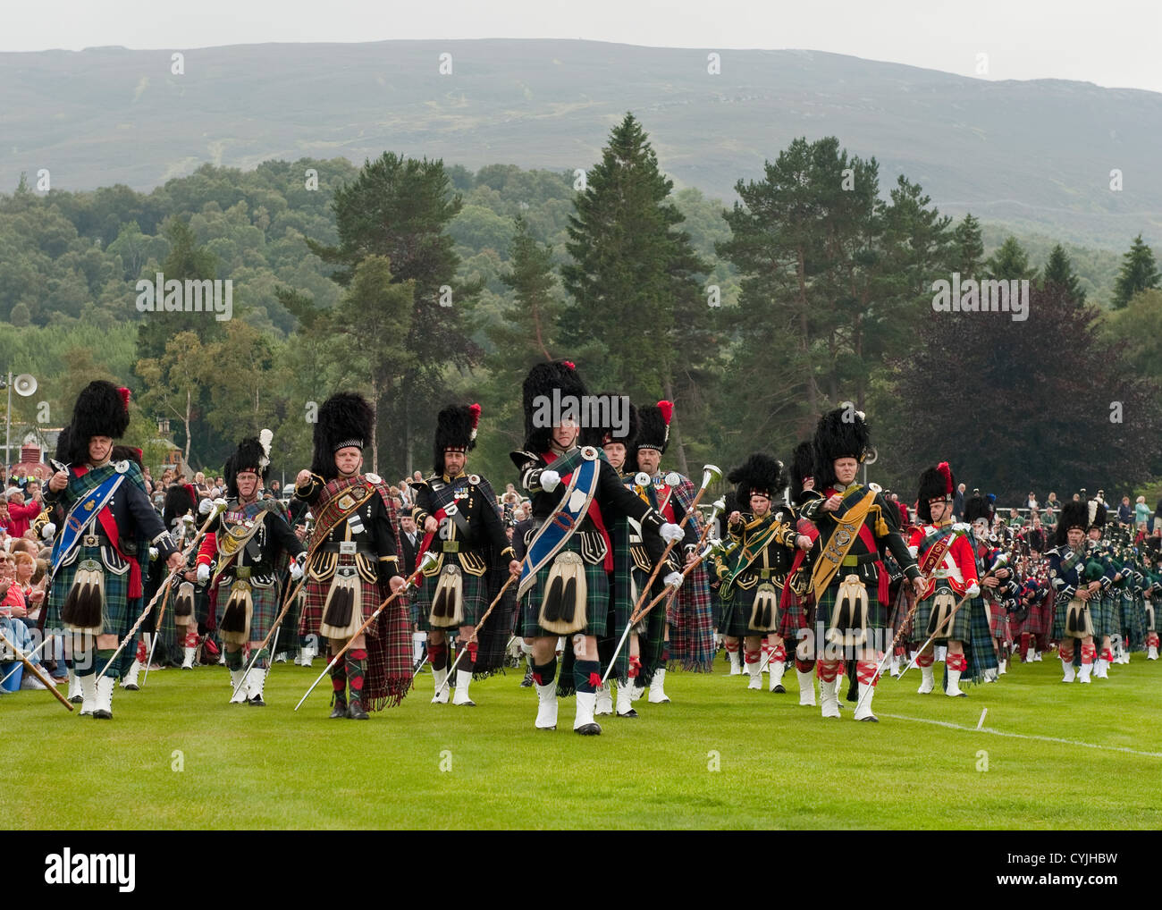 Scottish Massed Pipe Bands playing at the 'Braemar Gathering' (Highland Games), Scotland Stock Photo