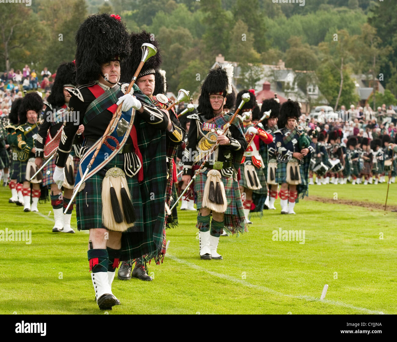 Scottish Massed Pipe Bands playing at the 'Braemar Gathering' (Highland Games), Scotland Stock Photo