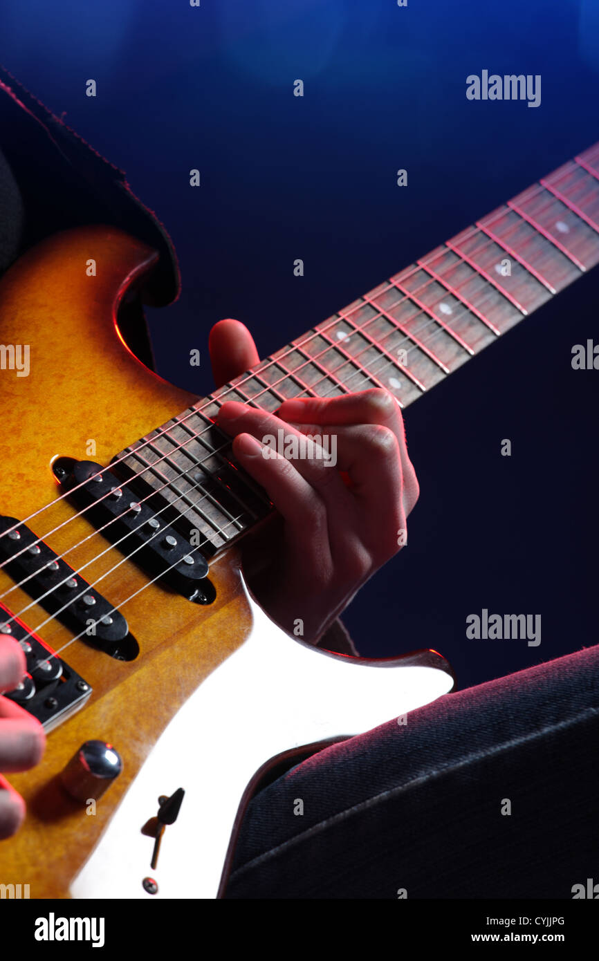 Guitar Player In Action On Stage Close Up Stock Photo Alamy