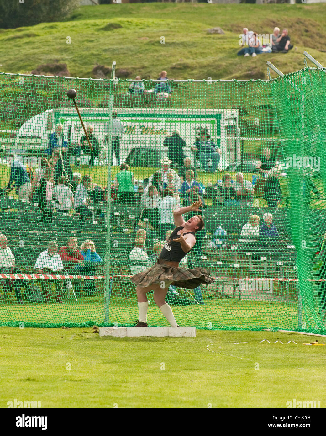 Hammer throwing at Highland Games. Braemar Highland Games Stock Photo