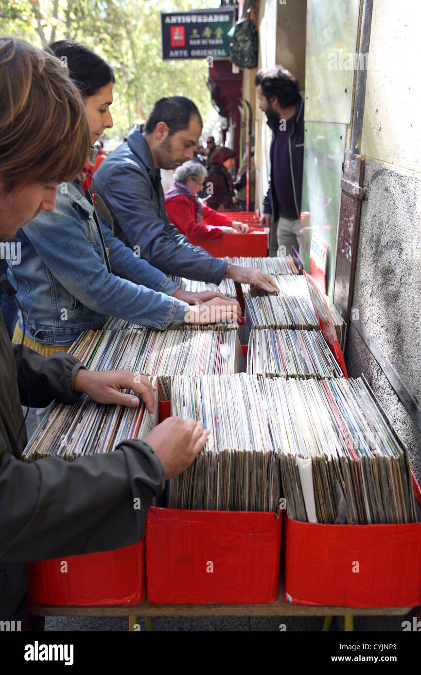 Customers browsing at second hand vinyl record stall on El rastro