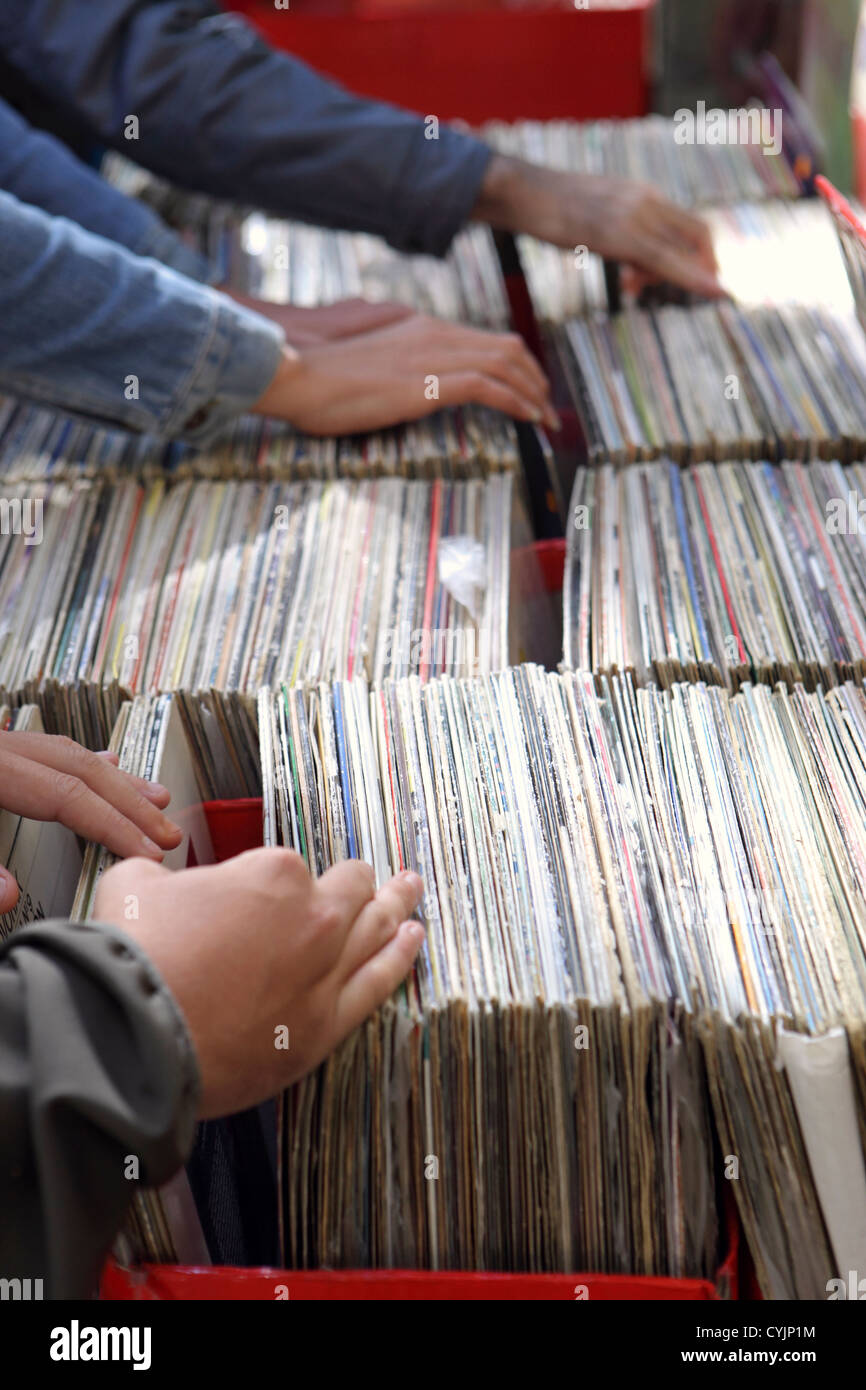 Customers browsing at second hand vinyl record stall on El rastro