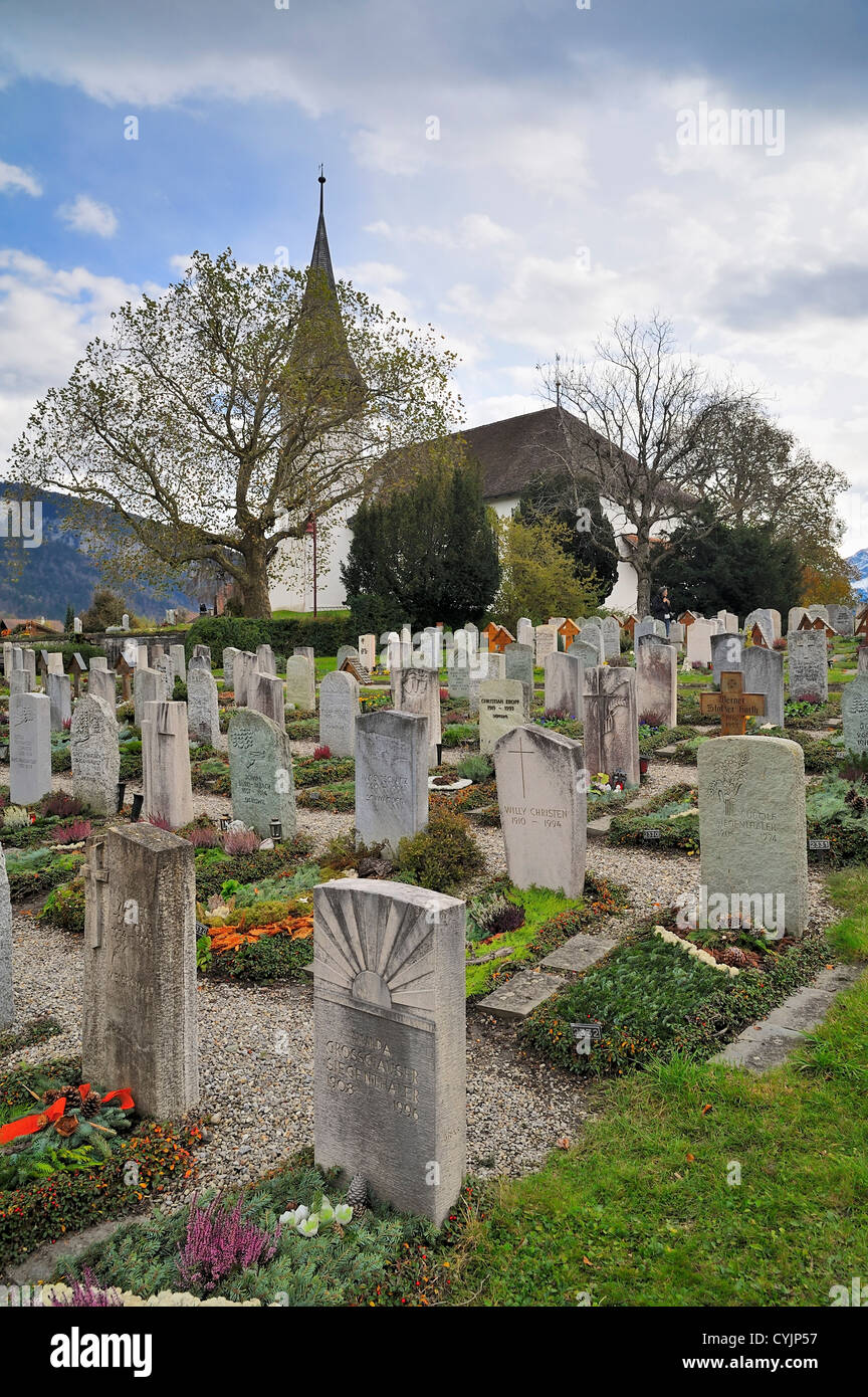 The church and cemetery in the mountain village of Sigriswil, Bern, Switzerland Stock Photo