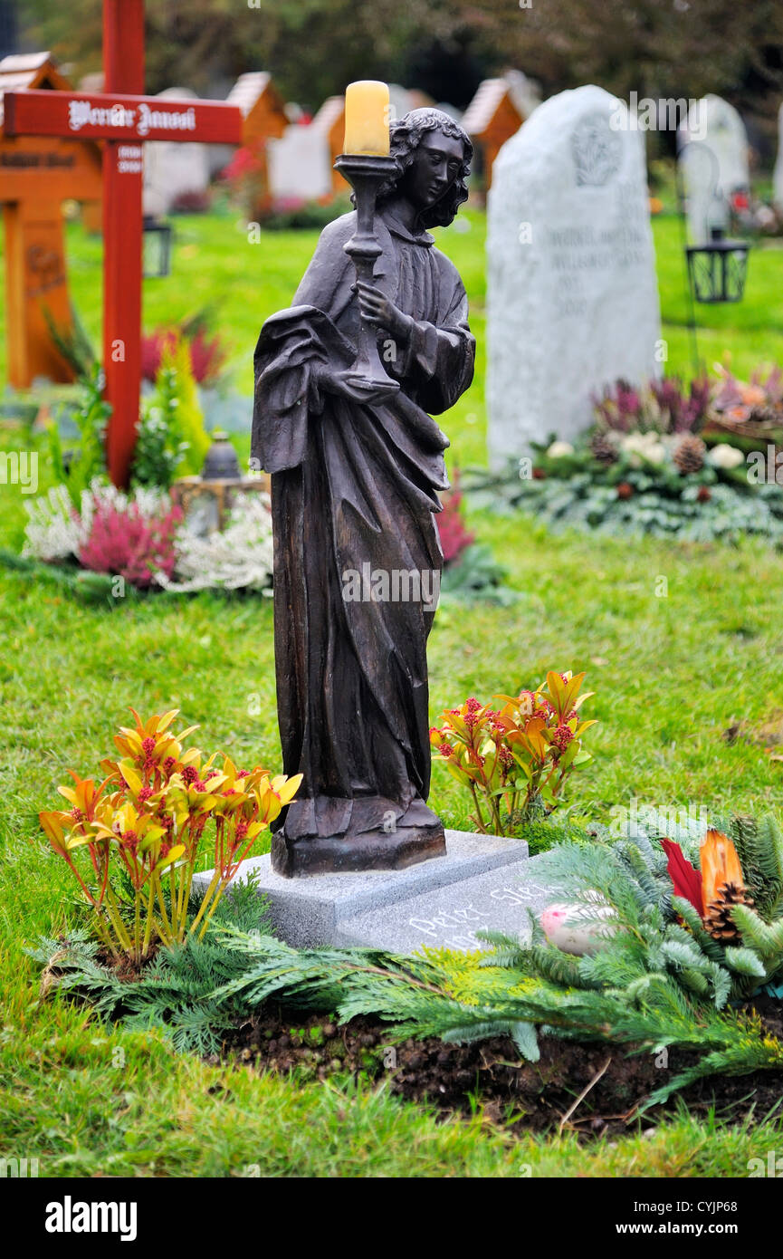 Headstone in the cemetery of the mountain village Sigriswil, Bern, Switzerland Stock Photo