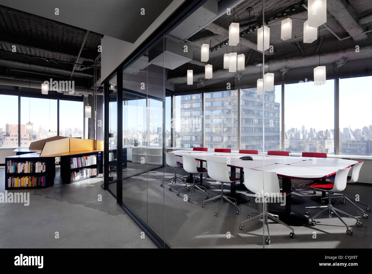 Private office, New York, United States. Architect: Bade Stageberg Cox, 2012. Custom desks, hanging light fixtures, conference r Stock Photo