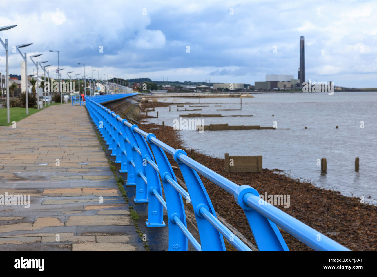 Blue railings at Carrickfergus’ seafront promenade Stock Photo - Alamy