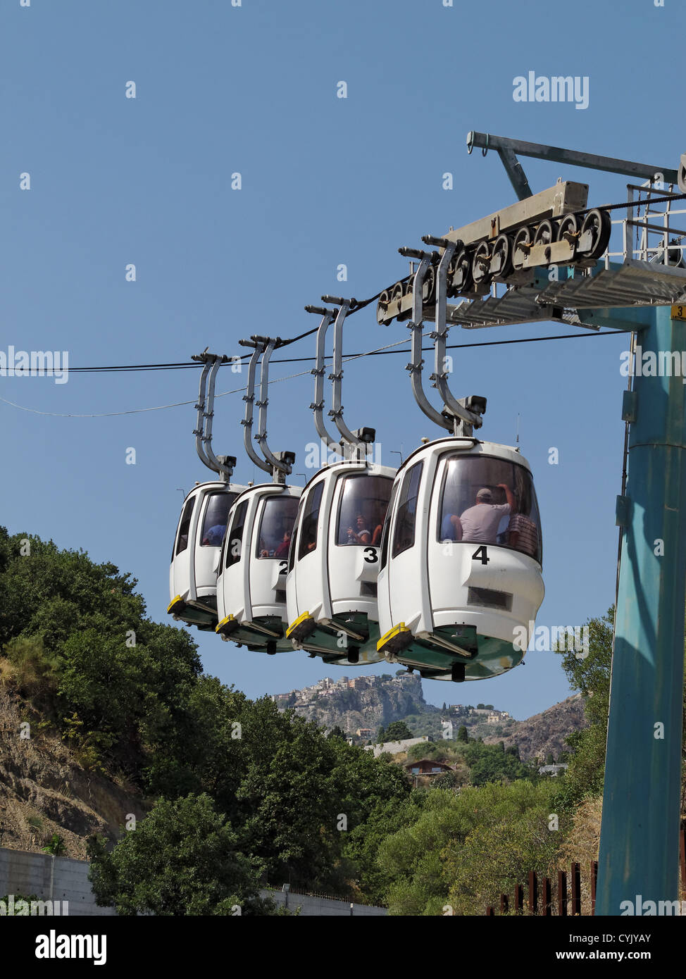 A cable car beginning its ascent to Taormina. Mazzaró, Sicily, Italy Stock Photo