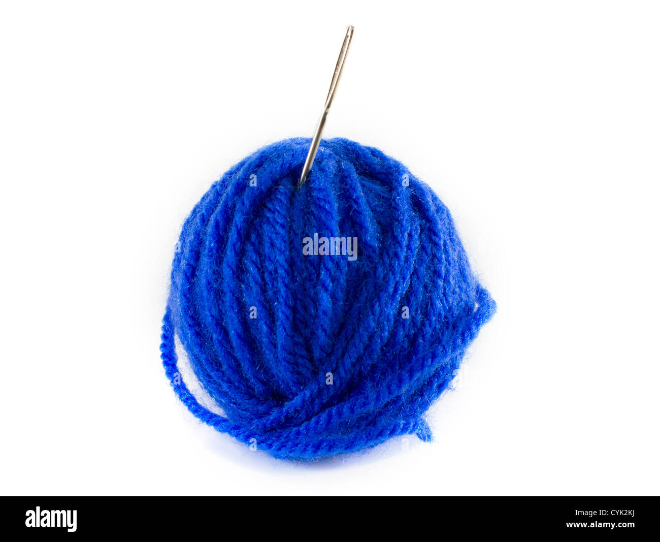 ball of blue wool and metal needle Stock Photo