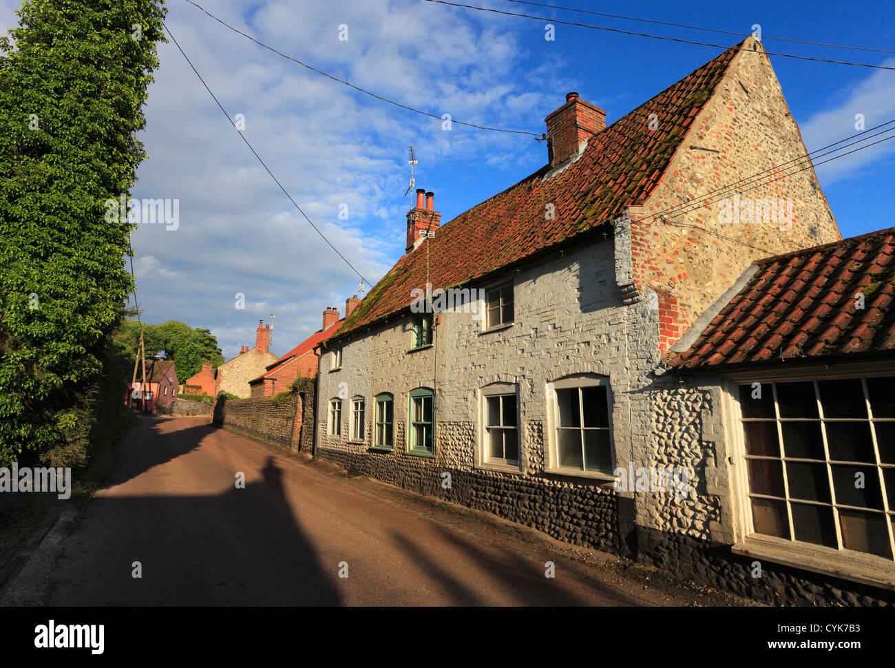 Old cottages and the coast road at Stiffkey, Norfolk, England, UK. Stock Photo