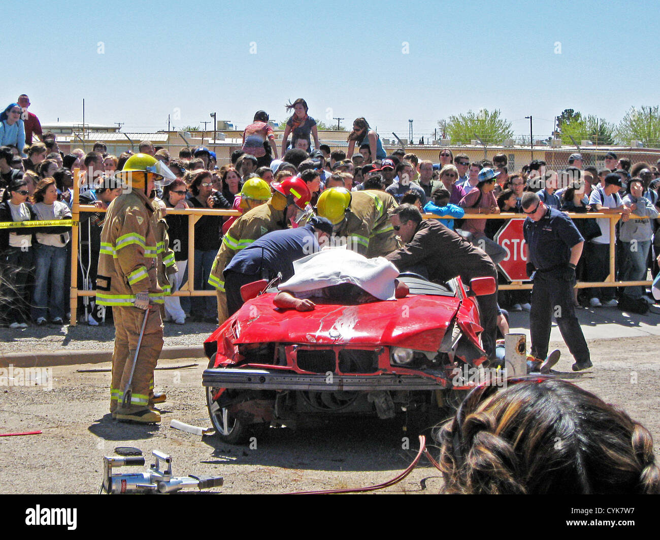 Rescuing "victims" from a crashed car at Alamogordo (New Mexico) High School for Every 15 Minutes, a national anti-drunk-driving Stock Photo