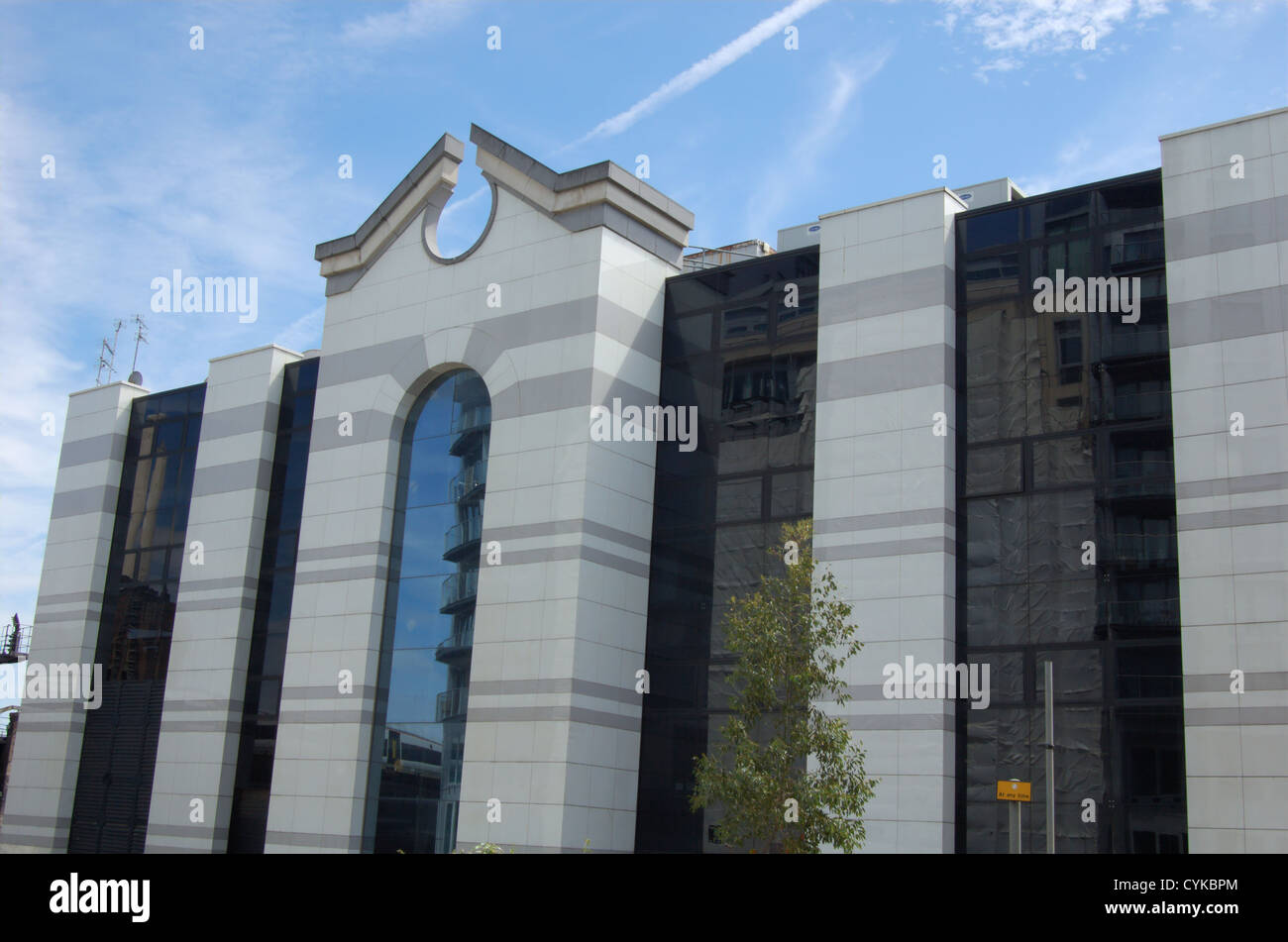 Facade of a modern office building against a blue sky Stock Photo - Alamy