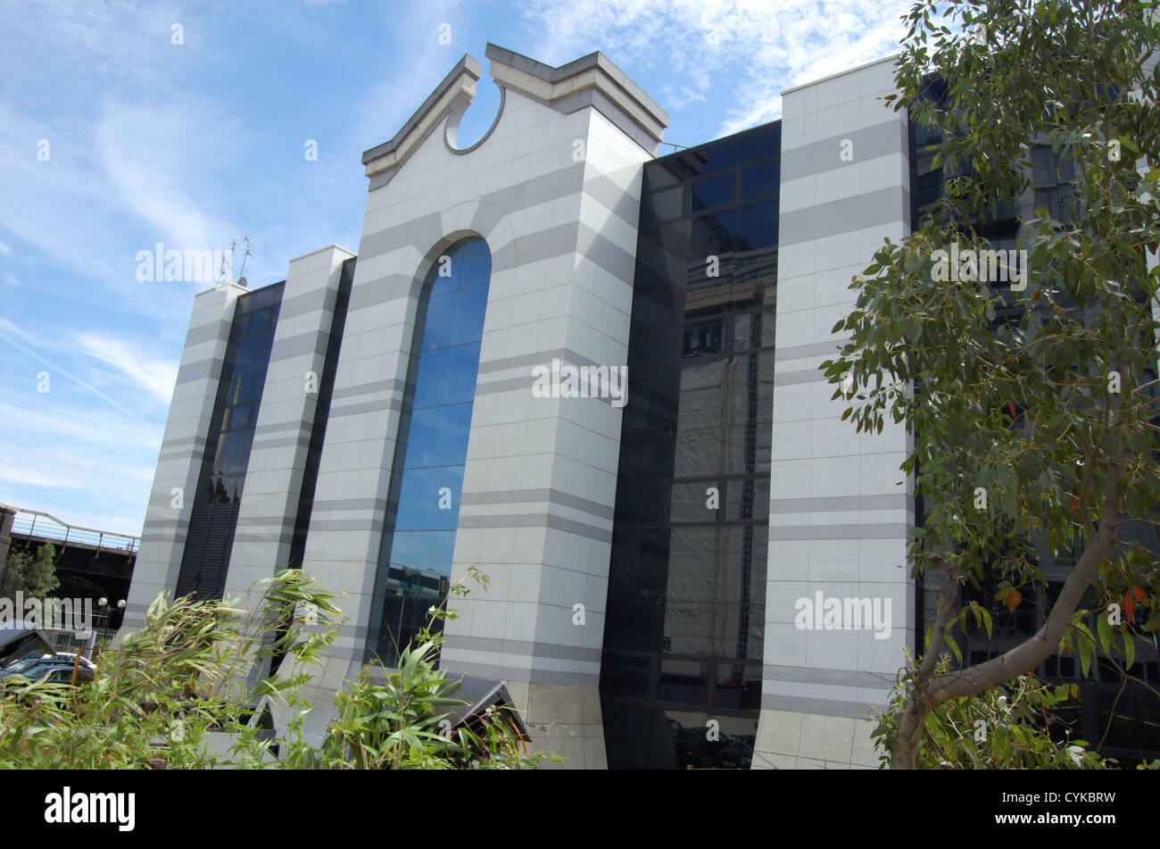 Facade of a modern office building against a blue sky Stock Photo - Alamy