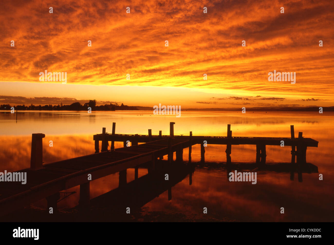 Jetty at sunset Lake Macquarie New South Wales NSW Australia Stock Photo