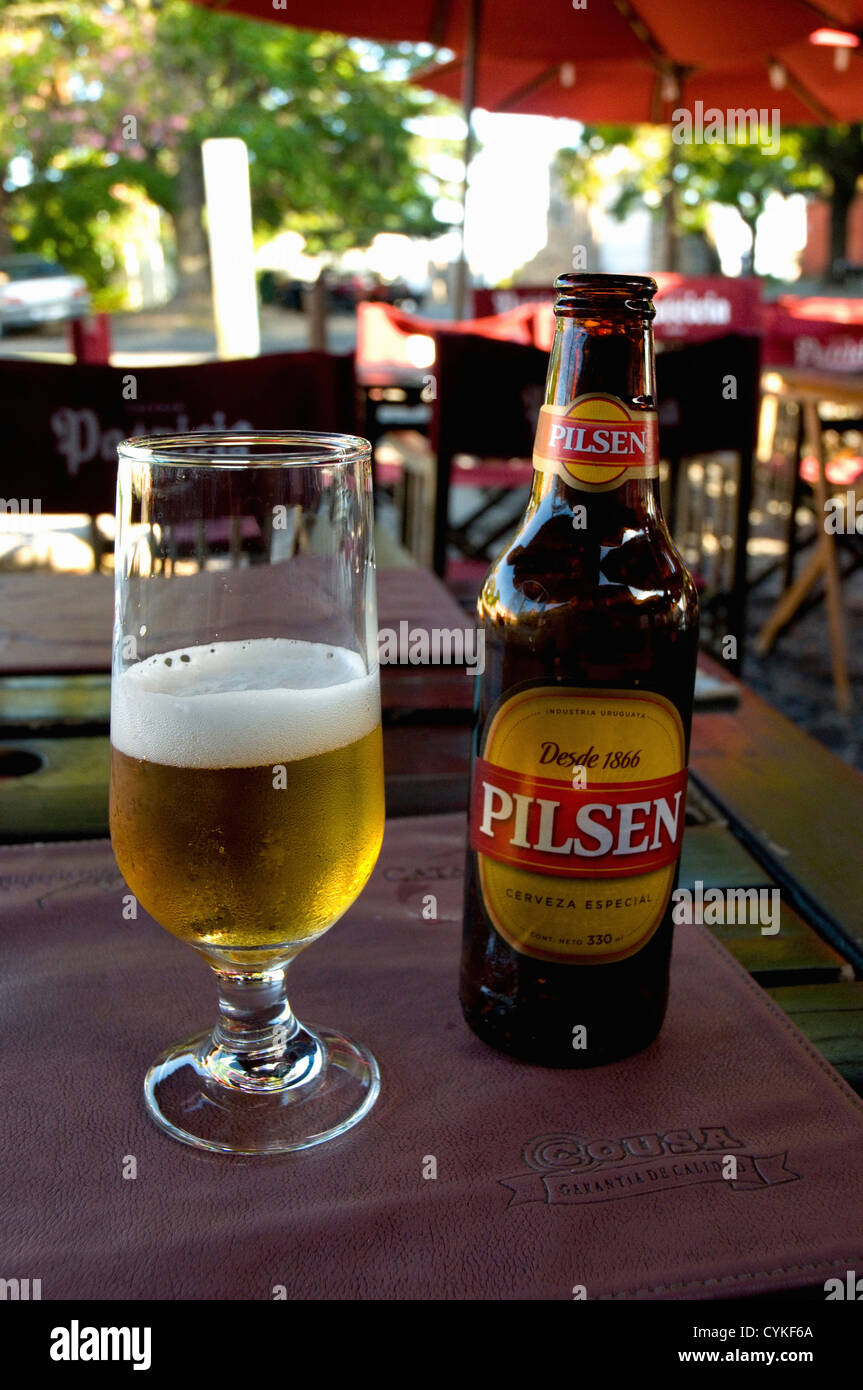 Uruguay. Colonia del Sacramento. Barrio Historico. Beer at an outdoor cafe. Stock Photo