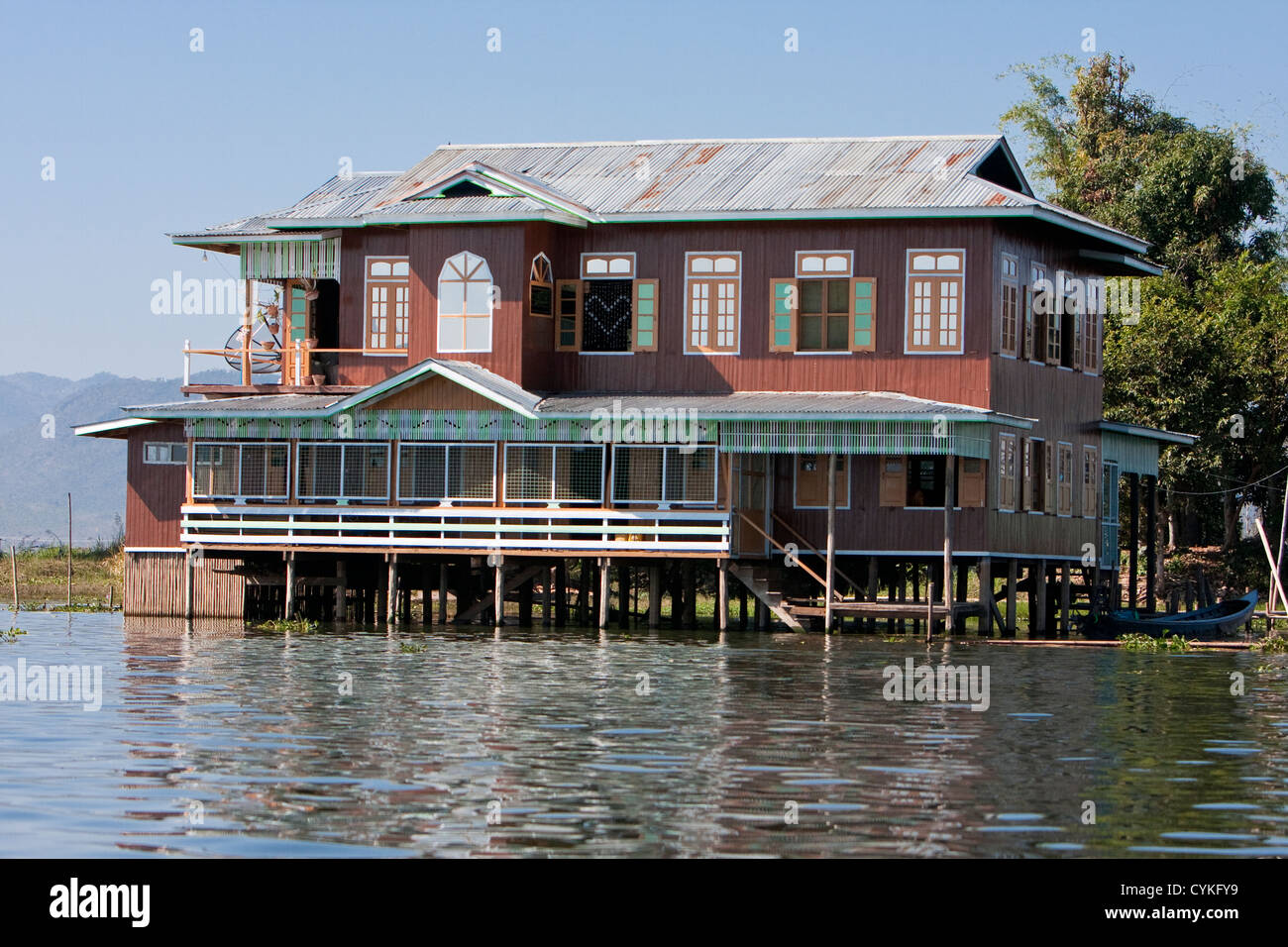Myanmar, Burma. Burmese House on Stilts, Inle Lake, Shan State. Note satellite dish on back left side. Stock Photo