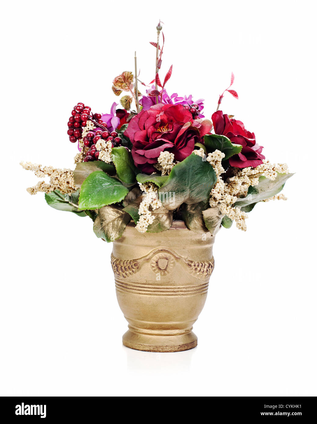 colorful flower bouquet from artificial flowers arrangement centerpiece in gold vase isolated on white background Stock Photo