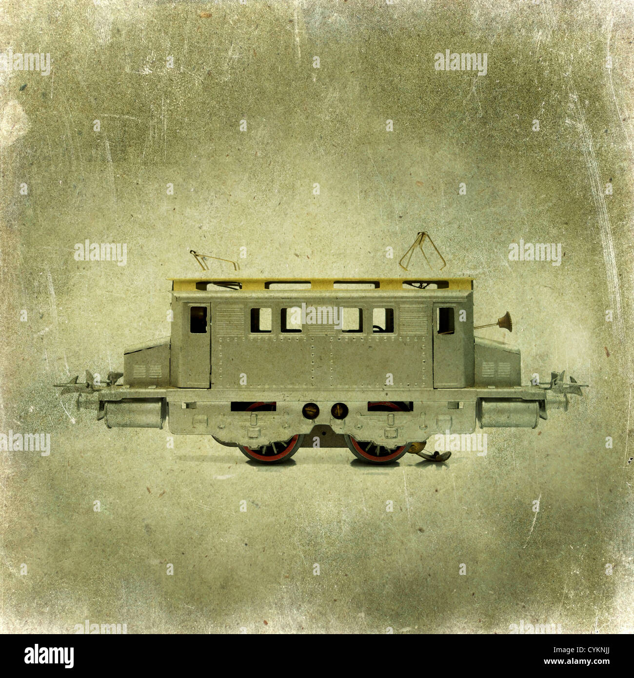 Vintage electric train model on a textured background showcasing intricate details and craftsmanship Stock Photo