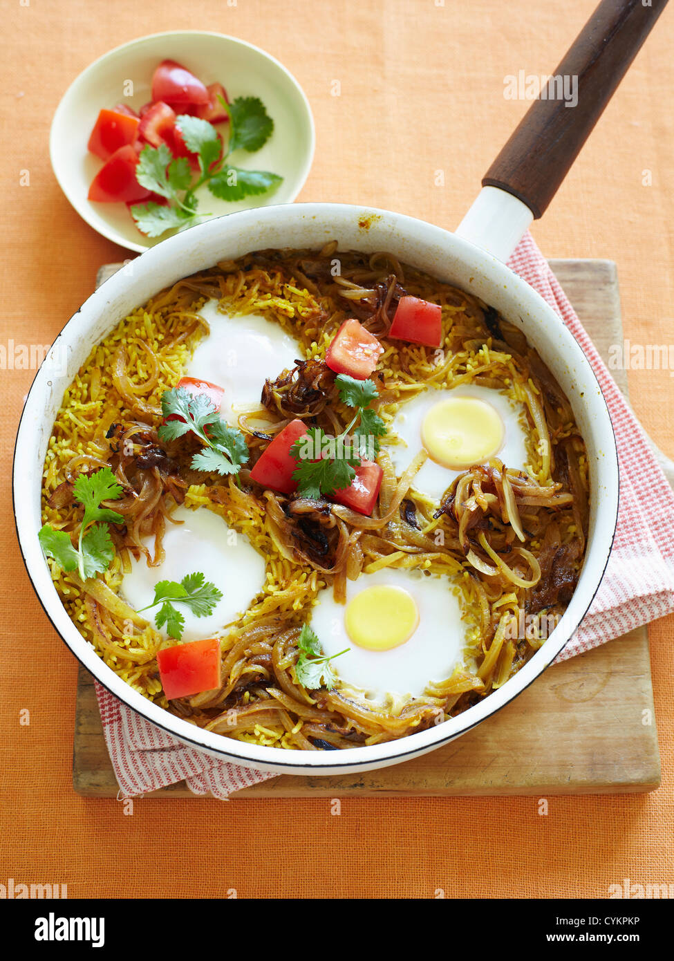 Pan of eggs rice and tomato Stock Photo Alamy