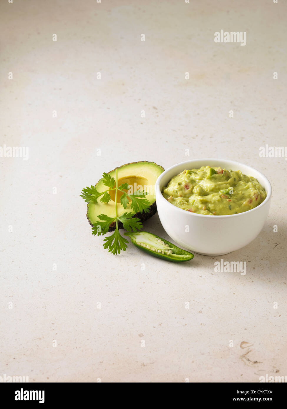 Bowl of guacamole with avocado Stock Photo