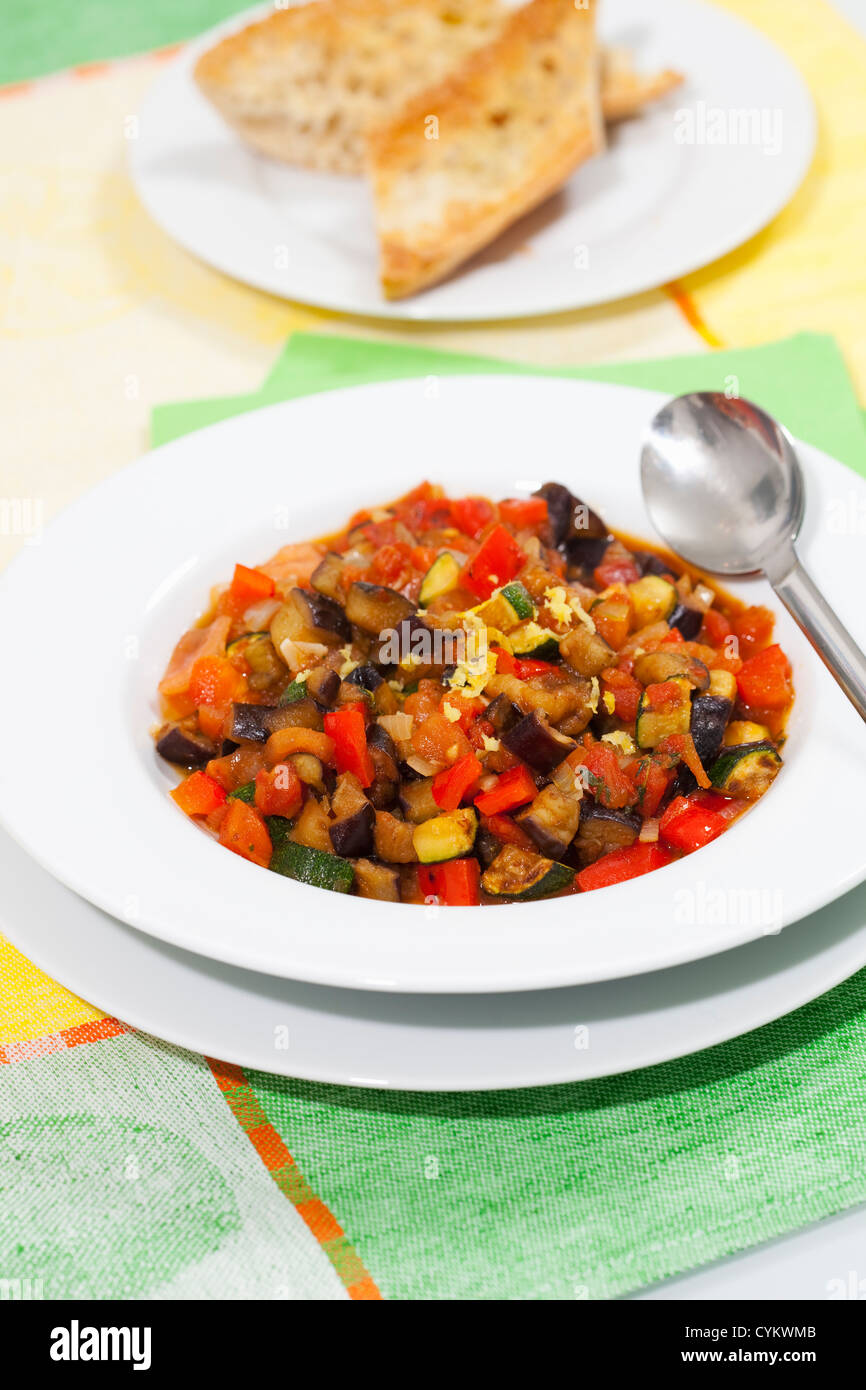 Bowl of ratatouille with bread Stock Photo Alamy