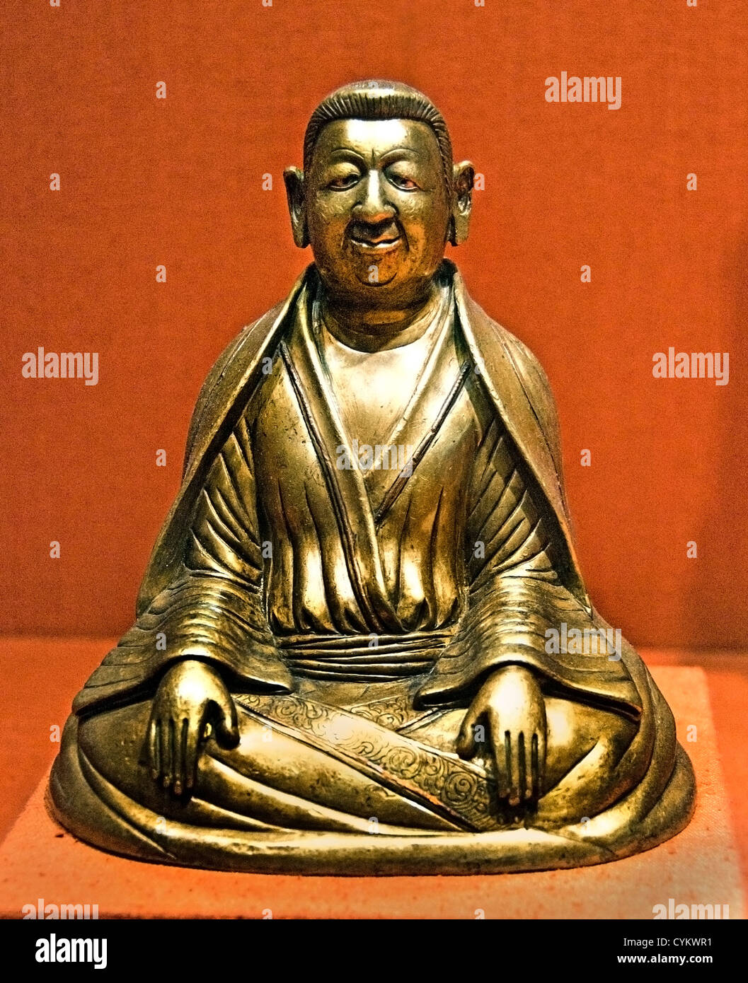 Portrait of The Great Teacher Marpa 12th century Tibet Tibetan Bronze inlaid with copper and silver gold plugs 19cm Stock Photo
