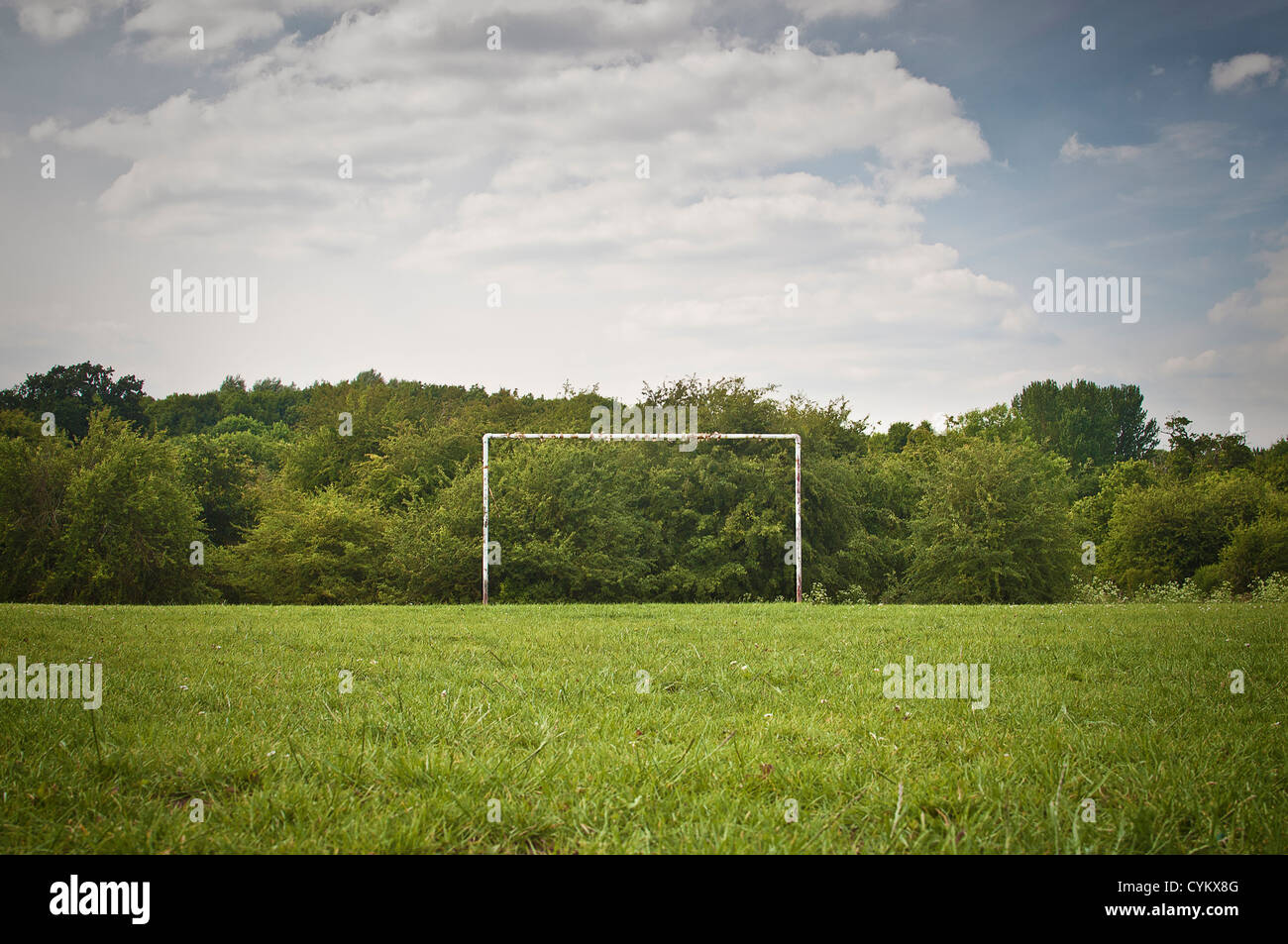 Soccer goal on grassy pitch Stock Photo
