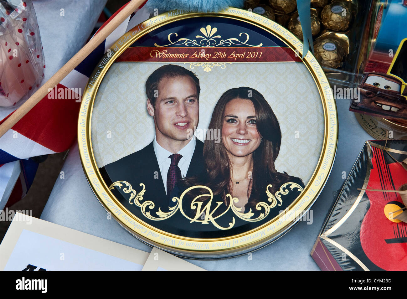 A royal wedding souvenir cake tin showing Prince William and Kate Middleton, at a street party to celebrate their marriage on the 29th April 2011 (UK) Stock Photo