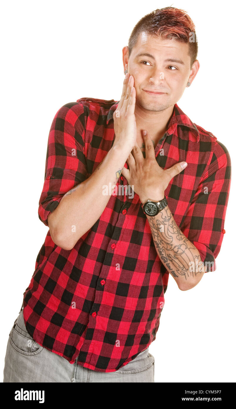 Bashful young European man in flannel shirt over white Stock Photo