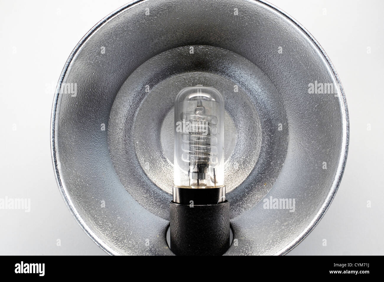 Large, odl fashioned flash, as used on top of reporter's cameras Stock Photo