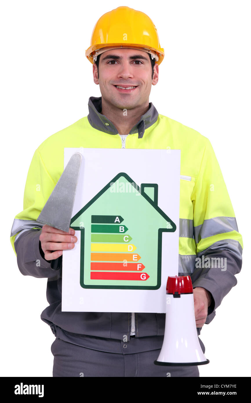 Builder with an energy efficient sign Stock Photo